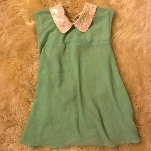 Sheer mint green tank